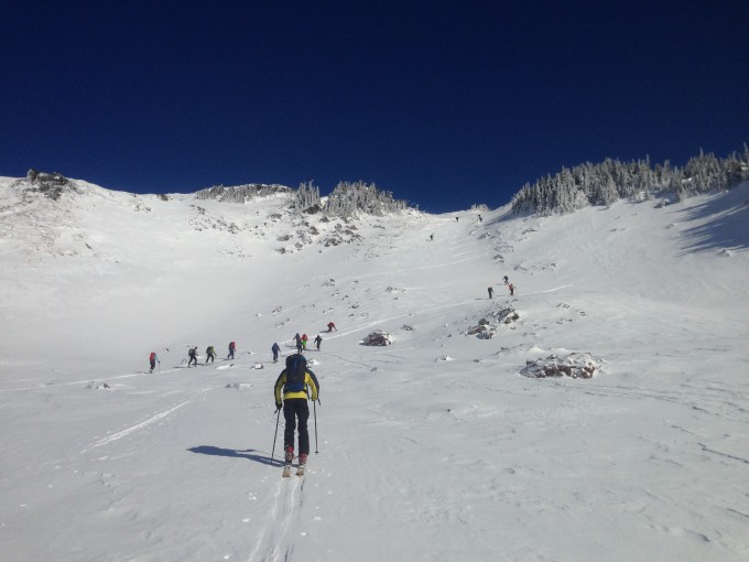 Congregation of skiers going up to Panorama Point