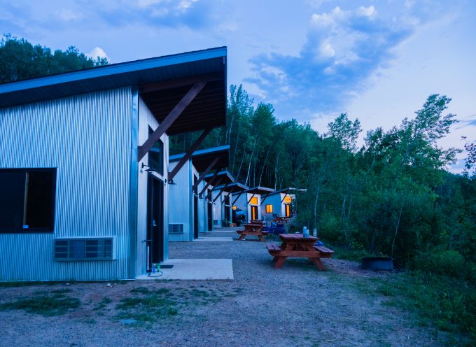 The six available cabins at dusk.