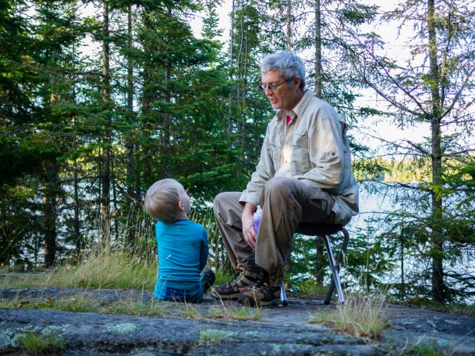 Jack and his Grandpa in our campsite on Brule Lake